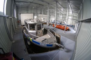 Nové lodní garáže policie u Veslařského ostrova. Pramen: ŘVC
